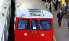 A Circle line train leaves Farringdon station.