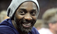 Idris Elba watches aat the O2 Arena in London, January 2015.