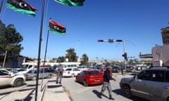 Libyan police officers set up checkpoints in the Libyan capital Tripoli in January this year as clashes continue in the west and east of the country.