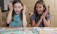 Children playing Monopoly