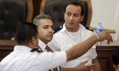 Canadian al-Jazeera English journalist Mohamed Fahmy, centre.