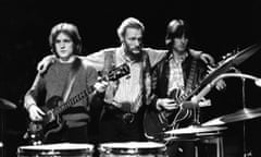 Jack Bruce, Ginger Baker and Eric Clapton from Cream pose together on stage during their farewell performance at the Royal Albert Hall in London on 26th November 1968.  