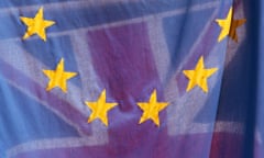 A European Union flag flies next to a Union flag at the European parliamentary building in Westminster.