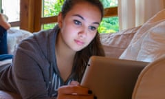 Girl reading on tablet