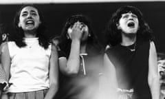 All my loving … fans watch the Beatles perform at Shea stadium, new York, in 1965.