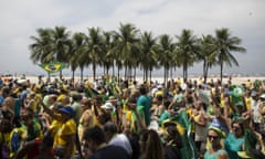 People march during a protest against Brazil's President Dilma Rousseff at Copacabana brach in Rio de Janeiro, Brazil, Sunday, March 15, 2015. Protests have been called for across Brazil to demonstrate against President Dilma Rousseff, whose popularity has never been lower as she faces a sputtering economy and a massive corruption scandal. (AP Photo/Felipe Dana)