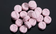 Pink coloured Ecstasy tablet