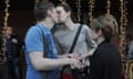 Russian men kiss in Moscow in 2012, a year before the 2013 law banning 'gay propaganda'.