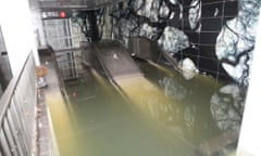 Escalators to the South Ferry Whitehall St. subway station in the financial district of Manhattan are shown flooded in the aftermath of Hurricane Sandy.  A new study finds that without human-caused global warming, the New York subways might not have been flooded.