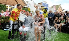 Cold shouldered: jockey Frankie Dettori and TV presenter Clare Balding take up the ice bucket challenge 