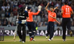 Mark Wood celebrates after bowling Mitchell Santner.