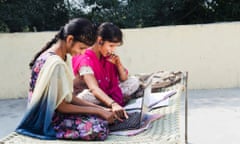 Indian rural student with laptop at home