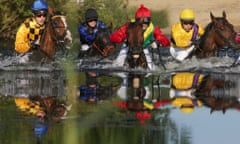 Winner Cevin Chan on Kazzi, left, in action during the gallop competition at the derby week in Hamburg, Germany