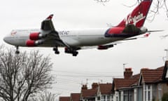 Plane over houses