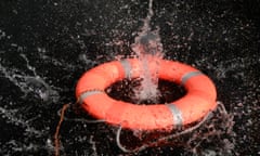 Life preserver floating on water