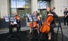 The Crystal Palace Quartet performing the opening recital of 'Requiem for Arctic ice' outside Shell's offices on the South Bank, London.
