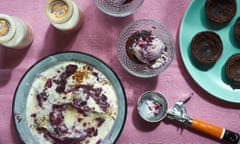 home-made ice-cream on a table with a scoop and chocolate brownie bowls