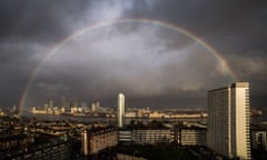 rainbow over london city skyline