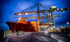 A container ship docks at London Gateway.