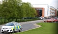 Police stand outside Corpus Christi Catholic College, Neville Road, Leeds