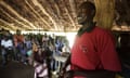  Amref driver Joseph explains the Katine project to church members