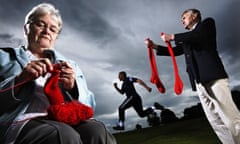 A man runs as people knit socks