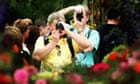 Visitors to the Chelsea Flower Show take photographs