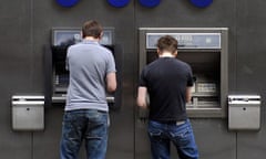 Men at RBS ATMs