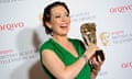 Olivia Colman poses with her Bafta