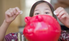 girl and piggy bank