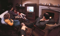 Family watching TV in 1968