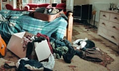 Clothes strewn across a rented room