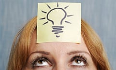 A lady with a post-it note showing a lightbulb on her forehead