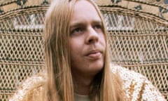 Rick Wakeman at home in a wicker chair, 1970s