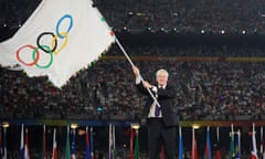 Boris Johnson waves the Olympic flag in the Bird's Nest stadium in Beijing on August 24 2008. Photograph: Jewel Samad/AFP/Getty Images