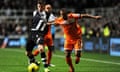 Newcastle United's Davide Santon and Swansea City's Wayne Routledge, right, in action.