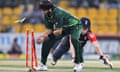 Pakistan's Shahid Afridi runs out England's Eoin Morgan