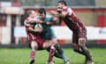 London Broncos' Craig Gower, centre, was very pleased to leave a freezing Mount Pleasant with a win