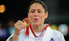Seotland's Louise Renicks celebrates her gold in the -52kg category of the judo in Glasgow.
