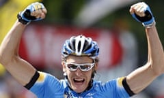 Team Columbia rider Marcus Burghardt celebrates victory in the 18th stage of the Tour de France