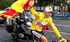 Carlos Sastre celbrates winning the Tour De France. Photograph: AFP/Joel Saget
