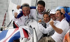 Iain Percy, second right, and Andrew Simpson, second left, celebrate with Peter Bentley, left, Bryony Shaw and Ben Ainslie
