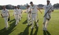 Ben Harmison walks off the pitch with Durham team-mate and brother Steve Harmison