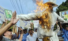 Pakistani protesters shout slogans as th