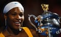 Serena Williams celebrates with her trophy after beating Justine Henin in the Australian Open final