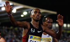 Mo Farah celebrates after his 3,000m victory