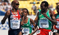 Ethiopia s Imane Merga, right, and Britain's Mo Farah, left, cross the finish line