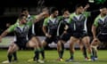 The Cook Island players perform their Haka before the rugby league World Cup match against the USA. 