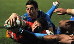 Daniel Foster scores Tonga's second try against Italy at The Shay.