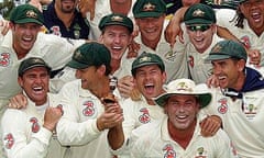 The Australian team pose with a replica of the urn